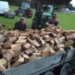 Johnny Dermody, Ger Ronan & Mick Marnell loading timber for the auction on Sunday